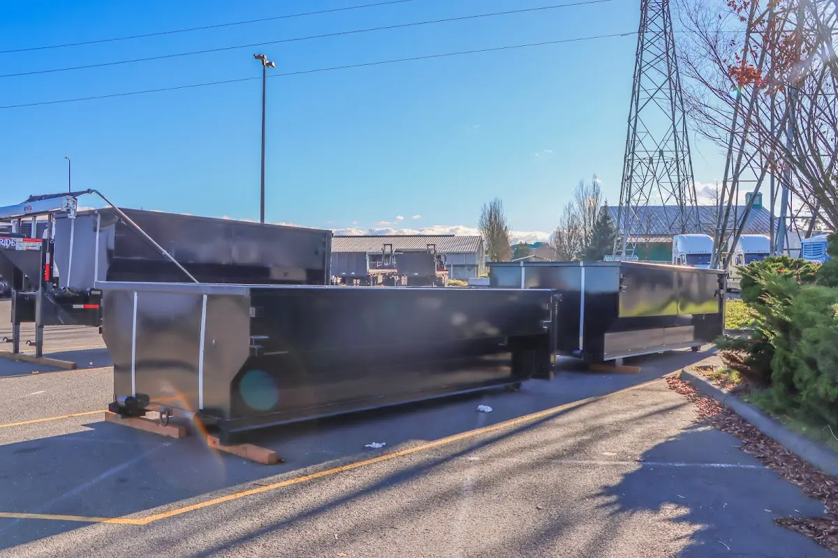 Roll-off dumpster ready for waste disposal at job site for 40 Yard Dumpster Rental in Holly Springs